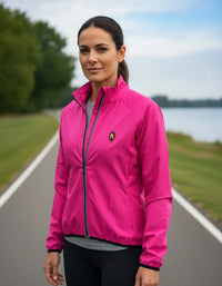 Cargar imagen en el visor de la galería, chaqueta cortaviento mujer liviana fucsia
